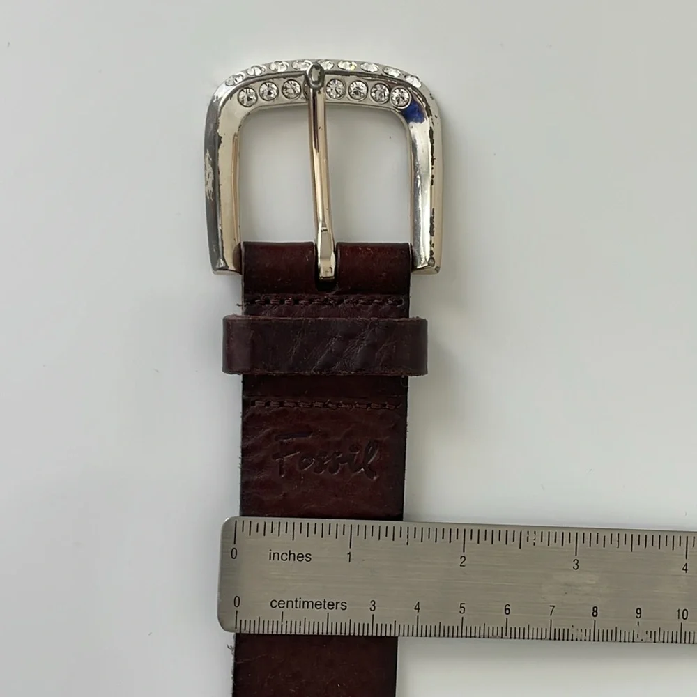 Fossil women’s Medium brown leather‎ belt. Silver buckle with rhinestones. EUC
